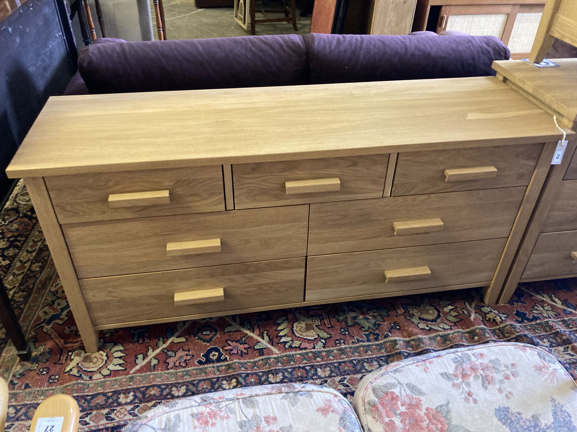 A modern contemporary oak seven-drawer chest, width 150cm, depth 45cm, height 71cm
